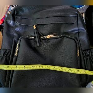 Black Backpack with Gold Accents